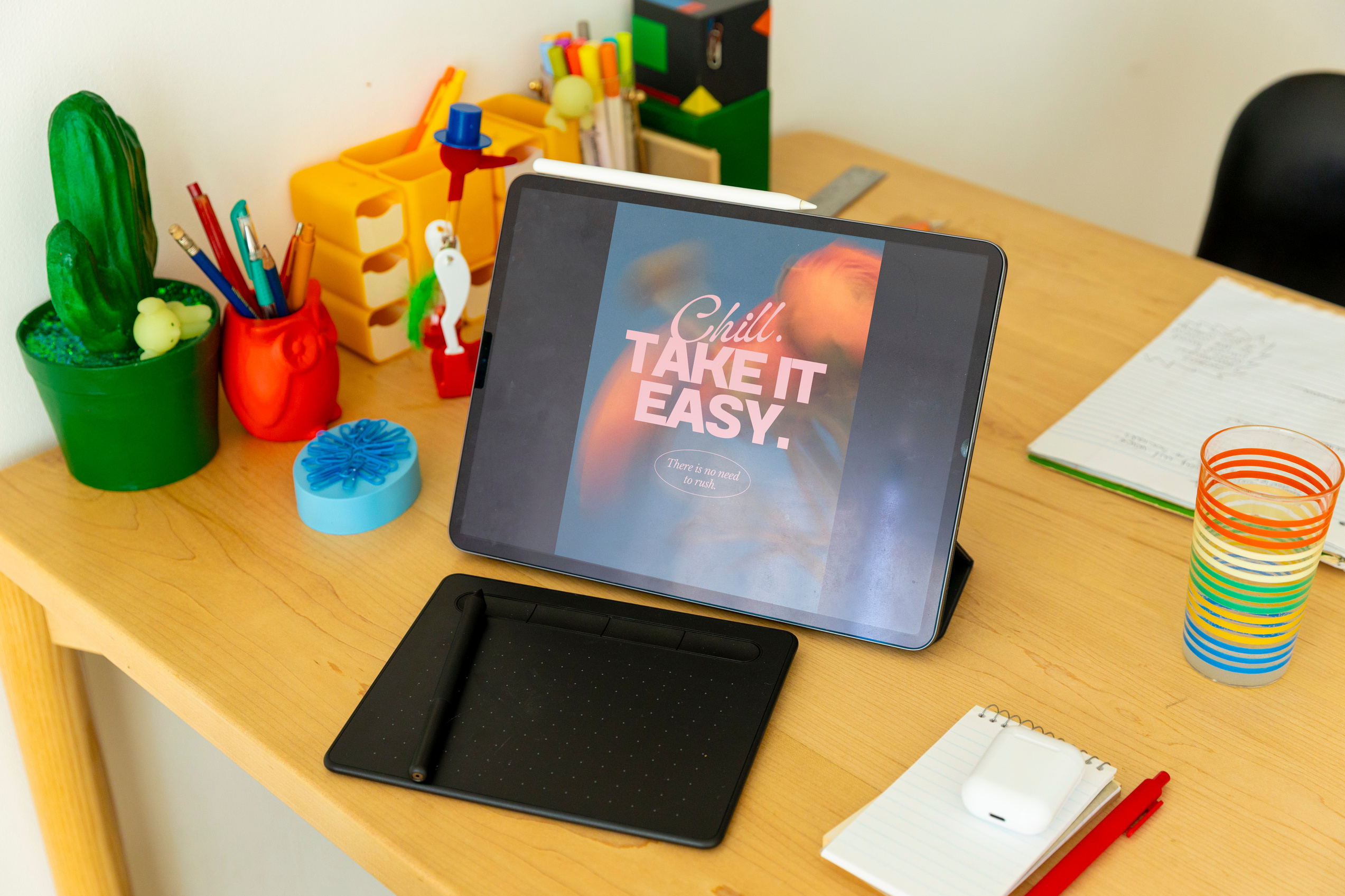 Poster Design on Tablet in Creative Studio